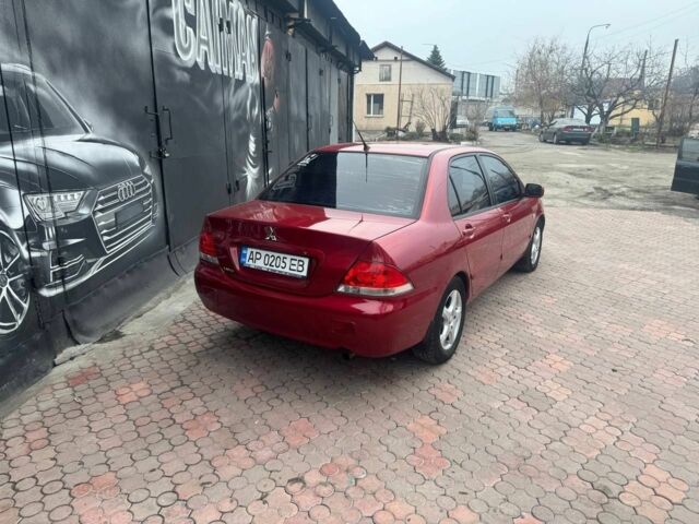 Красный Мицубиси Лансер, объемом двигателя 1.6 л и пробегом 276 тыс. км за 4350 $, фото 3 на Automoto.ua