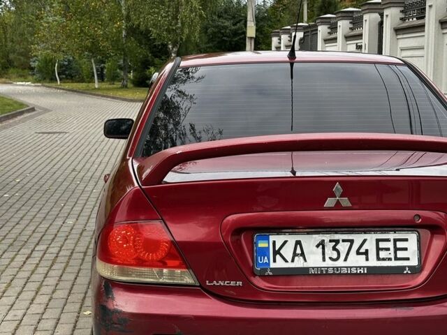 Червоний Міцубісі Lancer, об'ємом двигуна 1.6 л та пробігом 270 тис. км за 2200 $, фото 4 на Automoto.ua