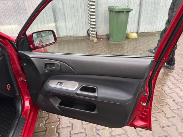 Червоний Міцубісі Lancer, об'ємом двигуна 1.6 л та пробігом 185 тис. км за 5000 $, фото 8 на Automoto.ua