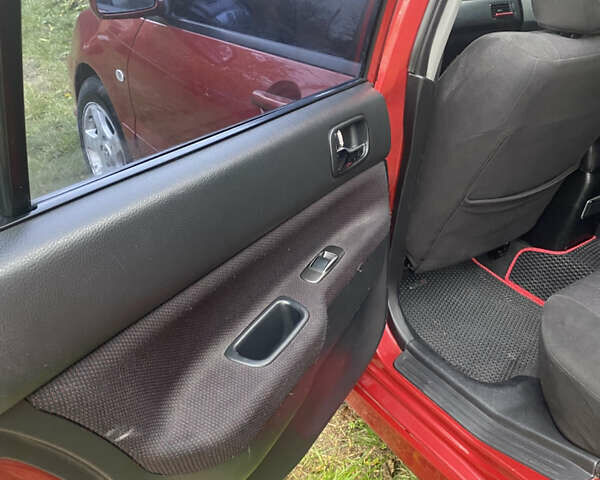 Міцубісі Lancer 2006 у Вышгороде на Automoto.ua Червоний Міцубісі Lancer, об'ємом двигуна 2 л та пробігом 320 тис. км за 2500 $, фото 5 на Automoto.ua