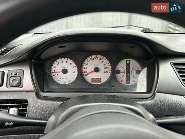 Красный Мицубиси Лансер, объемом двигателя 1.6 л и пробегом 185 тыс. км за 5000 $, фото 14 на Automoto.ua