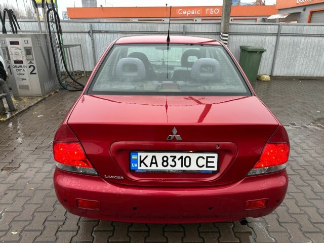 Червоний Міцубісі Lancer, об'ємом двигуна 1.6 л та пробігом 185 тис. км за 5000 $, фото 4 на Automoto.ua
