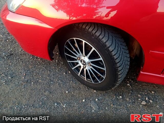 Мицубиси Лансер 2006 в Николаеве на Automoto.ua Красный Мицубиси Лансер, объемом двигателя 1.6 л и пробегом 260 тыс. км за 4600 $, фото 6 на Automoto.ua