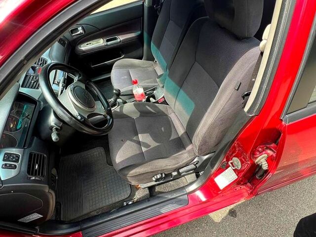 Красный Мицубиси Лансер, объемом двигателя 2 л и пробегом 223 тыс. км за 2900 $, фото 11 на Automoto.ua