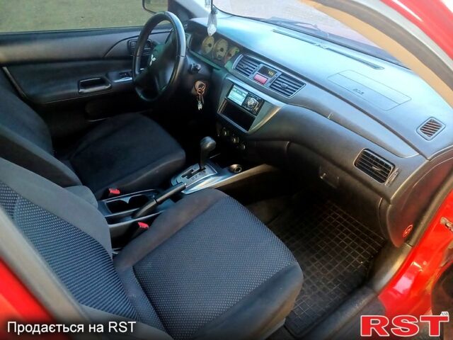 Мицубиси Лансер 2006 в Николаеве на Automoto.ua Красный Мицубиси Лансер, объемом двигателя 1.6 л и пробегом 260 тыс. км за 4600 $, фото 9 на Automoto.ua