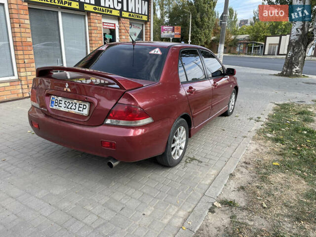 Червоний Міцубісі Lancer, об'ємом двигуна 1.58 л та пробігом 290 тис. км за 4250 $, фото 5 на Automoto.ua