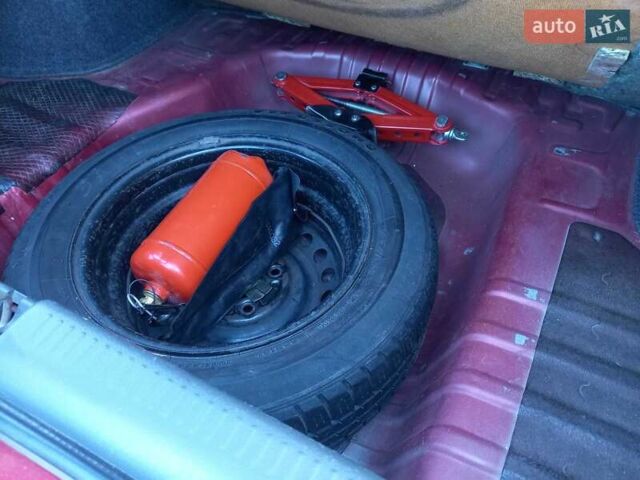 Червоний Міцубісі Lancer, об'ємом двигуна 1.6 л та пробігом 156 тис. км за 5200 $, фото 12 на Automoto.ua