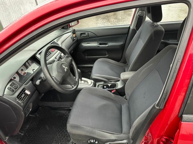 Червоний Міцубісі Lancer, об'ємом двигуна 1.6 л та пробігом 185 тис. км за 5000 $, фото 14 на Automoto.ua