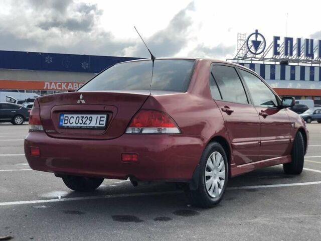 Червоний Міцубісі Lancer, об'ємом двигуна 1.6 л та пробігом 290 тис. км за 4300 $, фото 3 на Automoto.ua