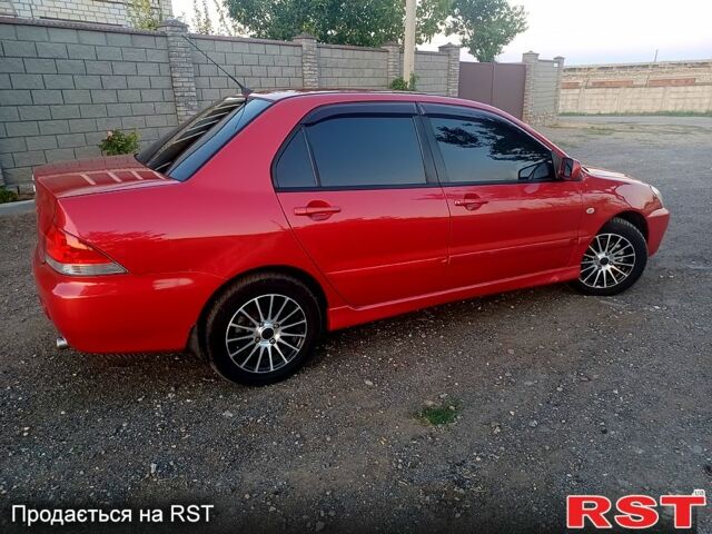 Мицубиси Лансер 2006 в Николаеве на Automoto.ua Красный Мицубиси Лансер, объемом двигателя 1.6 л и пробегом 260 тыс. км за 4600 $, фото 4 на Automoto.ua