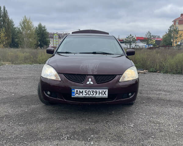 Червоний Міцубісі Lancer, об'ємом двигуна 2 л та пробігом 295 тис. км за 4150 $, фото 1 на Automoto.ua