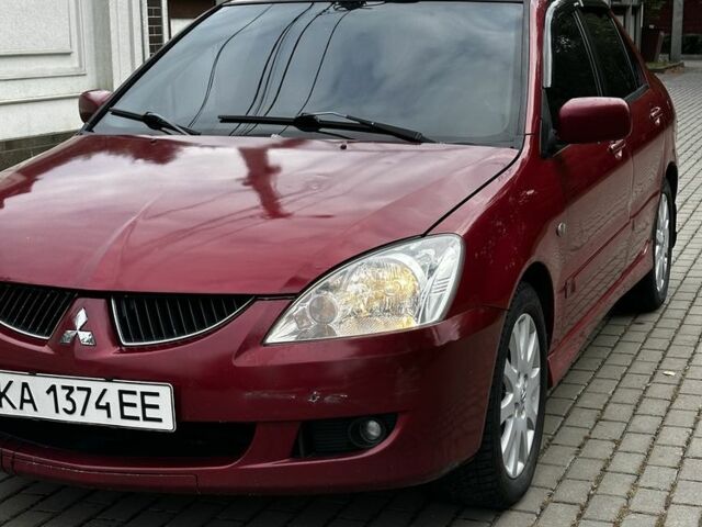 Червоний Міцубісі Lancer, об'ємом двигуна 1.6 л та пробігом 270 тис. км за 2200 $, фото 1 на Automoto.ua