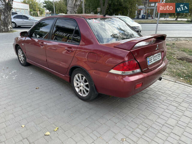 Червоний Міцубісі Lancer, об'ємом двигуна 1.58 л та пробігом 290 тис. км за 4250 $, фото 9 на Automoto.ua