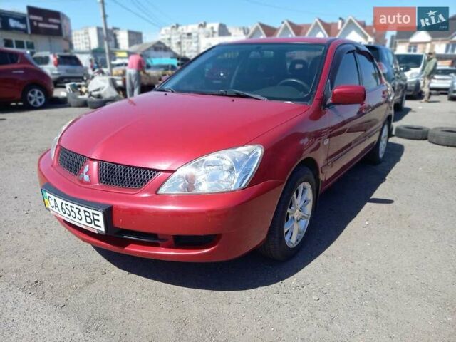 Червоний Міцубісі Lancer, об'ємом двигуна 1.6 л та пробігом 156 тис. км за 5200 $, фото 2 на Automoto.ua