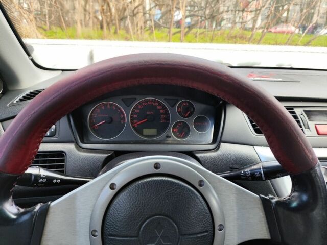 Червоний Міцубісі Lancer, об'ємом двигуна 2 л та пробігом 280 тис. км за 4500 $, фото 4 на Automoto.ua