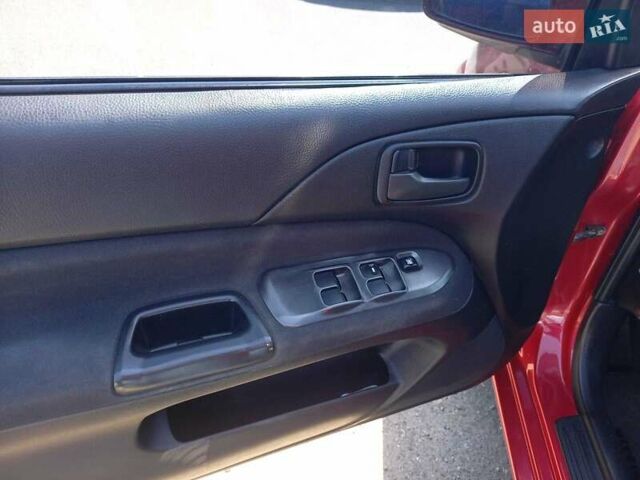 Червоний Міцубісі Lancer, об'ємом двигуна 1.6 л та пробігом 156 тис. км за 5200 $, фото 27 на Automoto.ua