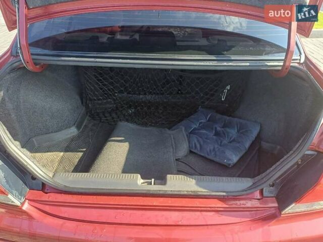 Красный Мицубиси Лансер, объемом двигателя 1.6 л и пробегом 73 тыс. км за 5500 $, фото 2 на Automoto.ua