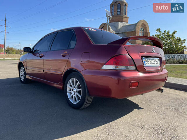Червоний Міцубісі Lancer, об'ємом двигуна 1.58 л та пробігом 290 тис. км за 4350 $, фото 8 на Automoto.ua