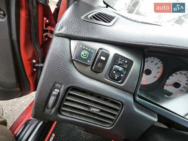 Червоний Міцубісі Lancer, об'ємом двигуна 1.6 л та пробігом 267 тис. км за 2999 $, фото 18 на Automoto.ua