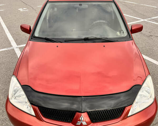 Червоний Міцубісі Lancer, об'ємом двигуна 1.6 л та пробігом 194 тис. км за 5500 $, фото 20 на Automoto.ua