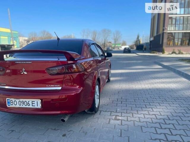 Червоний Міцубісі Lancer, об'ємом двигуна 2 л та пробігом 293 тис. км за 7350 $, фото 24 на Automoto.ua