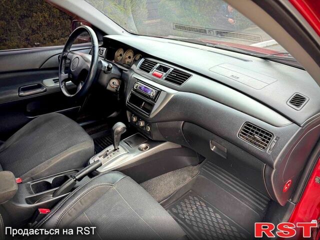 Красный Мицубиси Лансер, объемом двигателя 1.6 л и пробегом 262 тыс. км за 4699 $, фото 4 на Automoto.ua