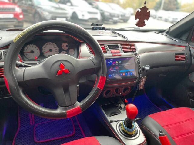 Мицубиси Лансер 2007 в Кривом Роге на Automoto.ua Красный Мицубиси Лансер, объемом двигателя 1.6 л и пробегом 252 тыс. км за 5400 $, фото 10 на Automoto.ua
