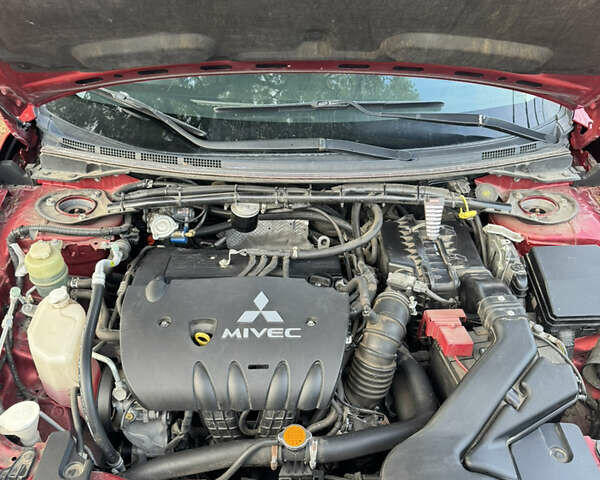 Червоний Міцубісі Lancer, об'ємом двигуна 2 л та пробігом 191 тис. км за 7200 $, фото 4 на Automoto.ua