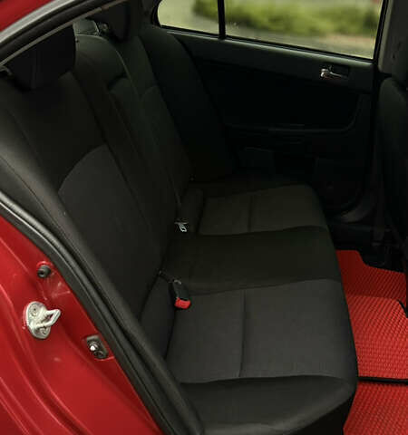 Красный Мицубиси Лансер, объемом двигателя 2 л и пробегом 261 тыс. км за 7200 $, фото 14 на Automoto.ua