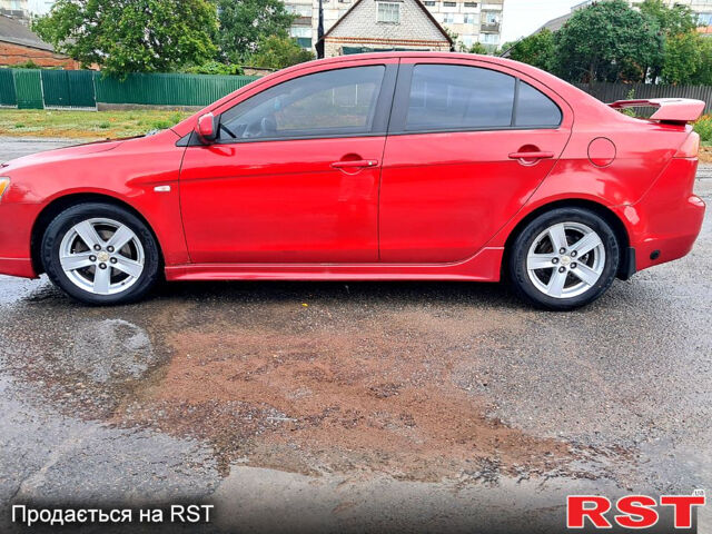 Червоний Міцубісі Lancer, об'ємом двигуна 2 л та пробігом 187 тис. км за 5000 $, фото 6 на Automoto.ua