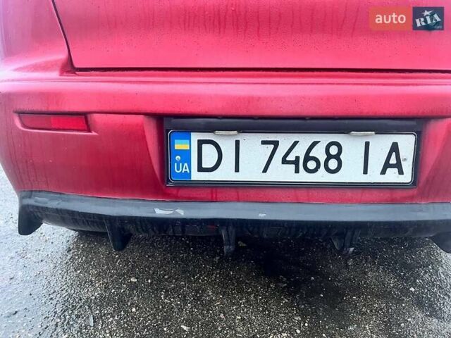 Красный Мицубиси Лансер, объемом двигателя 1.5 л и пробегом 241 тыс. км за 5850 $, фото 9 на Automoto.ua