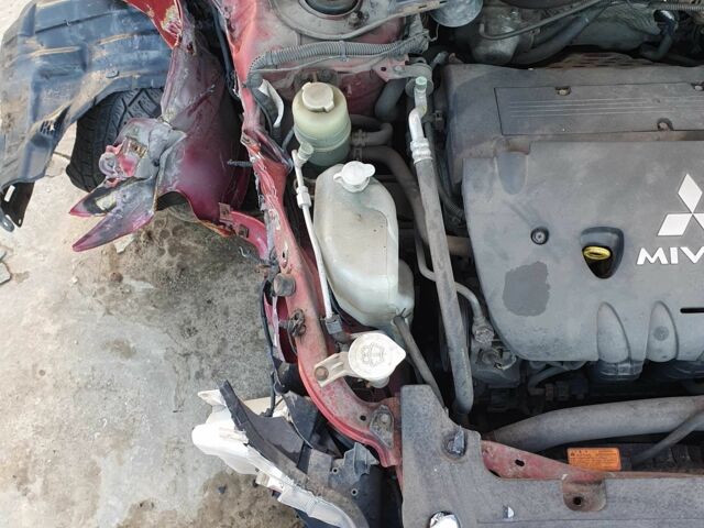 Красный Мицубиси Лансер, объемом двигателя 2 л и пробегом 406 тыс. км за 2750 $, фото 12 на Automoto.ua