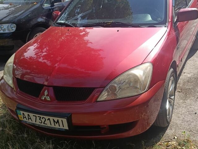 Красный Мицубиси Лансер, объемом двигателя 0 л и пробегом 221 тыс. км за 5500 $, фото 3 на Automoto.ua