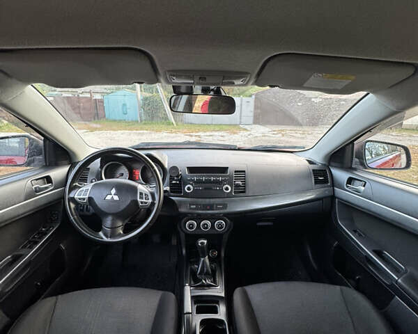 Червоний Міцубісі Lancer, об'ємом двигуна 2 л та пробігом 191 тис. км за 7200 $, фото 3 на Automoto.ua