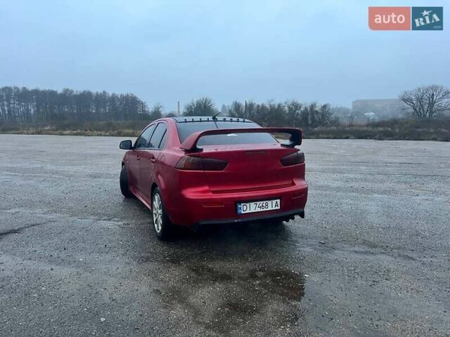 Красный Мицубиси Лансер, объемом двигателя 1.5 л и пробегом 241 тыс. км за 5850 $, фото 4 на Automoto.ua