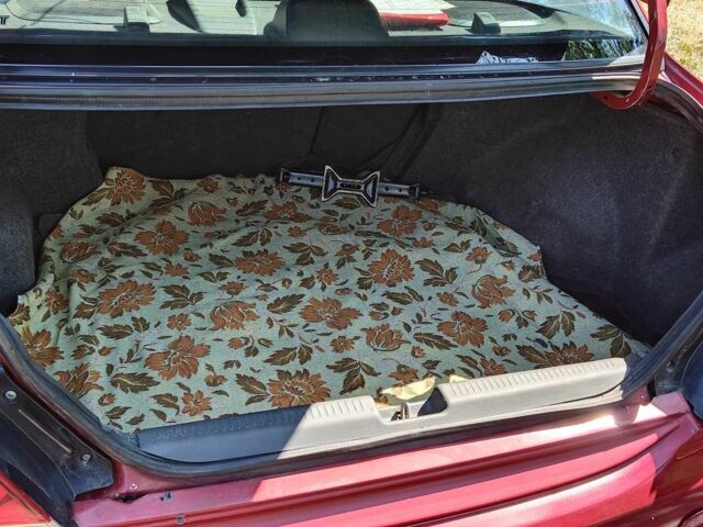 Красный Мицубиси Лансер, объемом двигателя 1.6 л и пробегом 216 тыс. км за 4500 $, фото 9 на Automoto.ua