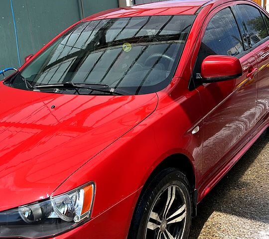 Красный Мицубиси Лансер, объемом двигателя 1.5 л и пробегом 145 тыс. км за 6500 $, фото 2 на Automoto.ua