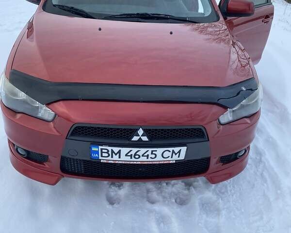 Червоний Міцубісі Lancer, об'ємом двигуна 2 л та пробігом 171 тис. км за 7500 $, фото 23 на Automoto.ua