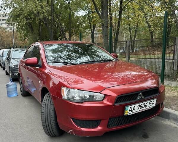 Красный Мицубиси Лансер, объемом двигателя 1.5 л и пробегом 240 тыс. км за 5400 $, фото 1 на Automoto.ua
