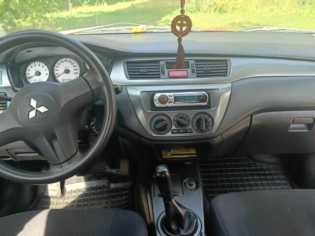 Красный Мицубиси Лансер, объемом двигателя 0 л и пробегом 221 тыс. км за 5500 $, фото 7 на Automoto.ua