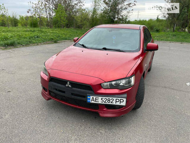 Червоний Міцубісі Lancer, об'ємом двигуна 2 л та пробігом 175 тис. км за 7500 $, фото 16 на Automoto.ua