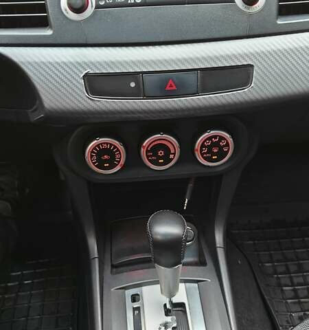 Міцубісі Lancer 2007 у Києві на Automoto.ua Червоний Міцубісі Lancer, об'ємом двигуна 2 л та пробігом 186 тис. км за 5600 $, фото 21 на Automoto.ua