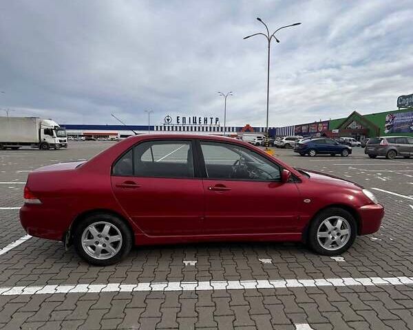 Красный Мицубиси Лансер, объемом двигателя 1.6 л и пробегом 176 тыс. км за 4300 $, фото 3 на Automoto.ua