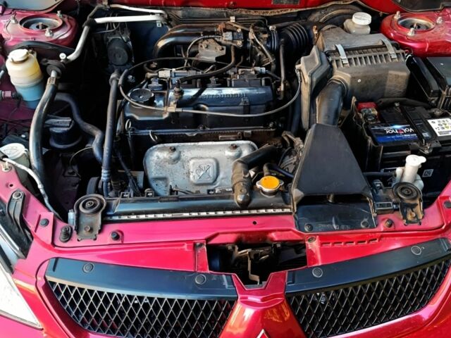 Красный Мицубиси Лансер, объемом двигателя 0 л и пробегом 252 тыс. км за 5400 $, фото 7 на Automoto.ua