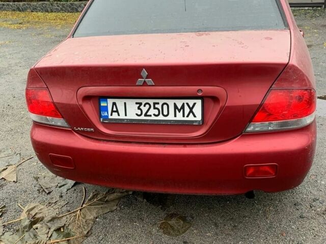 Червоний Міцубісі Lancer, об'ємом двигуна 1.6 л та пробігом 300 тис. км за 2799 $, фото 4 на Automoto.ua
