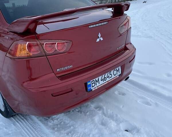 Червоний Міцубісі Lancer, об'ємом двигуна 2 л та пробігом 171 тис. км за 7500 $, фото 24 на Automoto.ua