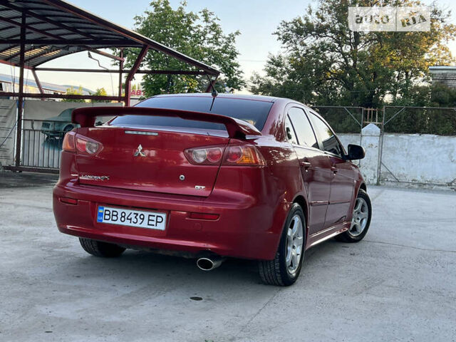 Червоний Міцубісі Lancer, об'ємом двигуна 2 л та пробігом 250 тис. км за 6500 $, фото 3 на Automoto.ua