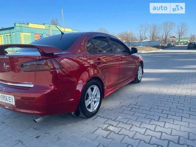 Червоний Міцубісі Lancer, об'ємом двигуна 2 л та пробігом 293 тис. км за 7350 $, фото 11 на Automoto.ua