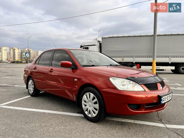 Червоний Міцубісі Lancer, об'ємом двигуна 1.6 л та пробігом 194 тис. км за 5500 $, фото 16 на Automoto.ua
