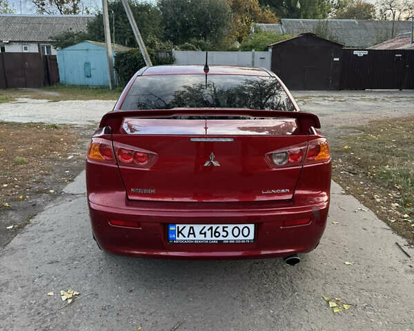 Червоний Міцубісі Lancer, об'ємом двигуна 2 л та пробігом 191 тис. км за 7200 $, фото 2 на Automoto.ua